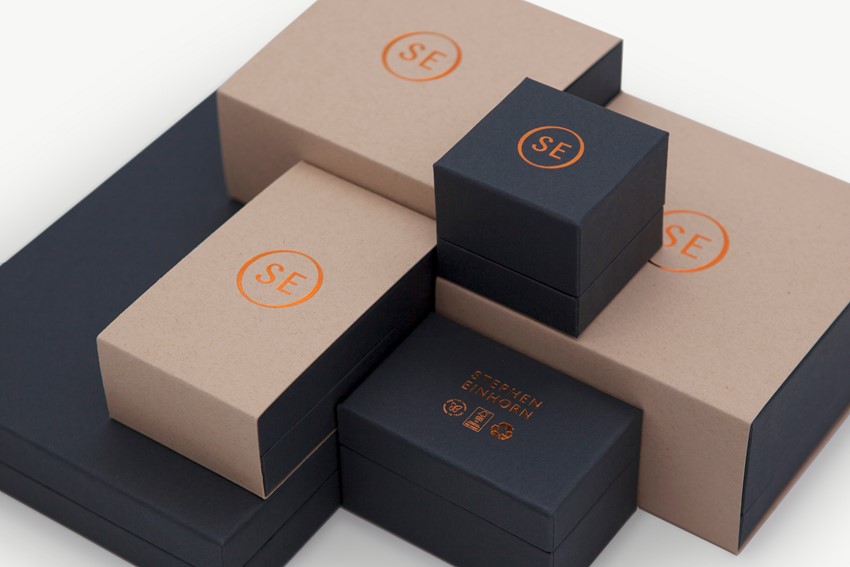 Stationery design of letterhead and business cards for the company Anders on top of a blurred photo of a house interior.